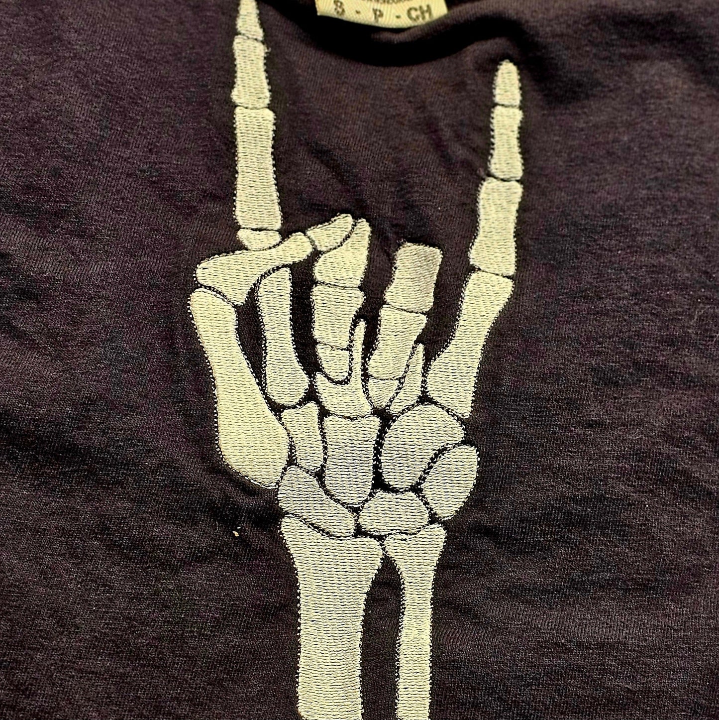 Embroidered Skeleton Rock on Hands Comfort Colors Tee